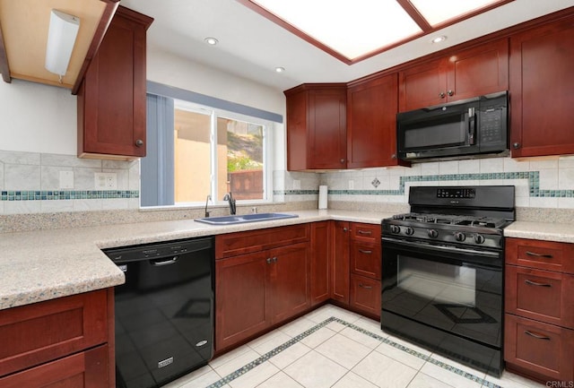 1403 Manzana Way, San Diego, CA 92139 - kitchen featuring black appliances, decorative backsplash, light tile patterned floors, and recessed lighting