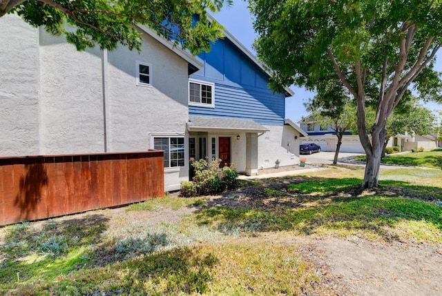 1403 Manzana Way, San Diego, CA 92139 - rear view of house with stucco siding