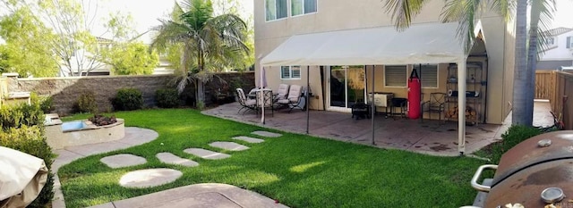 1702 Brezar St, Chula Vista, CA 91913 - rear view of house featuring a fenced backyard, a patio, and stucco siding