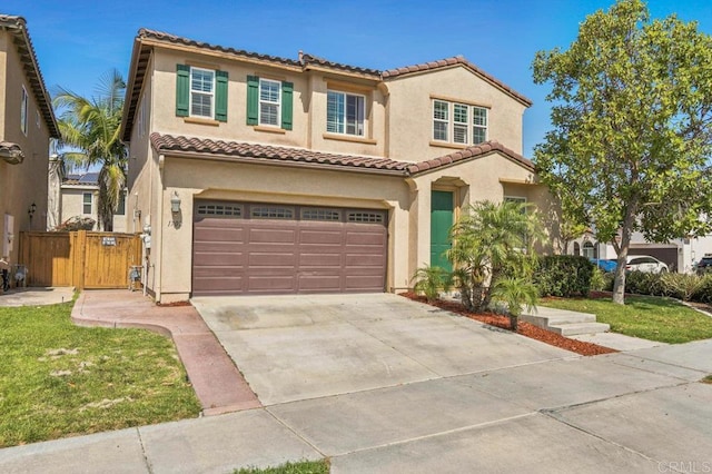 1702 Brezar St, Chula Vista, CA 91913 - mediterranean / spanish house with an attached garage, stucco siding, driveway, a tile roof, and a gate