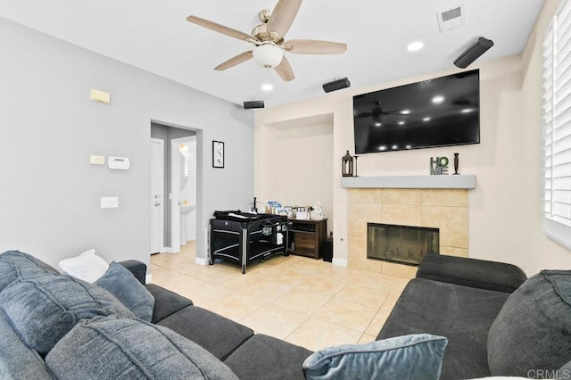 1702 Brezar St, Chula Vista, CA 91913 - tiled living area with ceiling fan, a fireplace, and recessed lighting