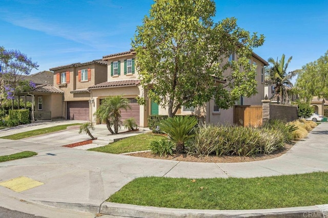1702 Brezar St, Chula Vista, CA 91913 - view of front of property with an attached garage, stucco siding, concrete driveway, and a tiled roof