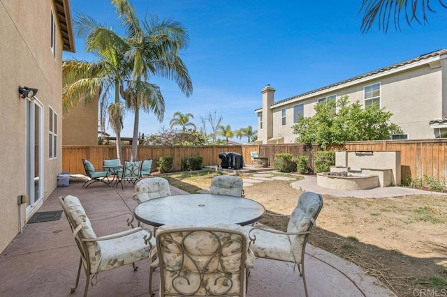 1702 Brezar St, Chula Vista, CA 91913 - fenced backyard with outdoor dining space and a patio area