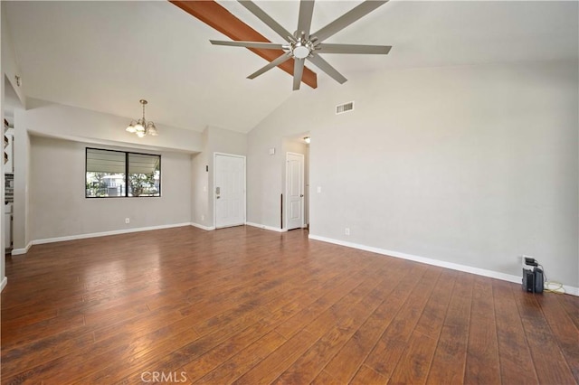 41015 163rd St E, Lancaster, CA 93535 - unfurnished living room featuring a chandelier, beamed ceiling, ceiling fan, dark wood-style floors, and high vaulted ceiling