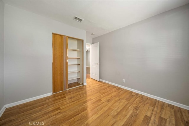 41015 163rd St E, Lancaster, CA 93535 - unfurnished bedroom with light wood-style floors and a closet