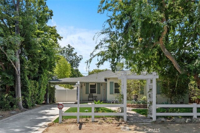 12424 Sarah St, Studio City, CA 91604 - single story home featuring driveway, an attached carport, and stucco siding