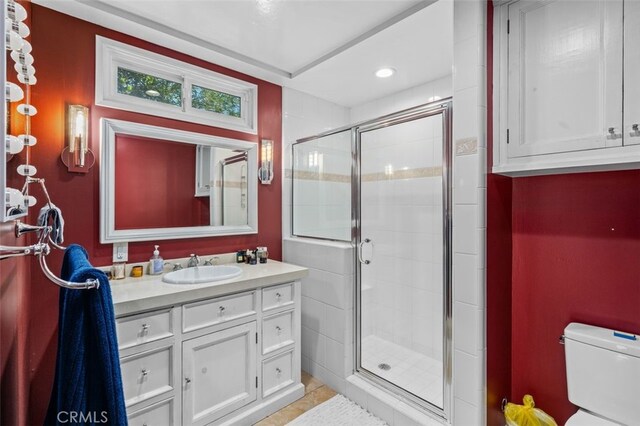 12424 Sarah St, Studio City, CA 91604 - bathroom featuring vanity, a shower stall, recessed lighting, and tile patterned flooring