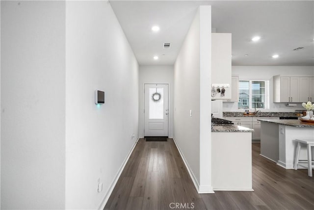12366 Ranchito Way, Victorville, CA 92392 - hallway with dark wood finished floors and recessed lighting