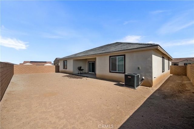 12366 Ranchito Way, Victorville, CA 92392 - back of property featuring stucco siding and a fenced backyard