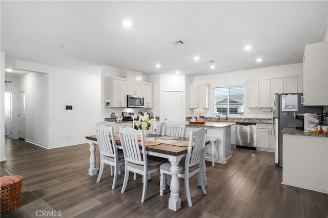 12366 Ranchito Way, Victorville, CA 92392 - dining space with dark wood-style floors and recessed lighting