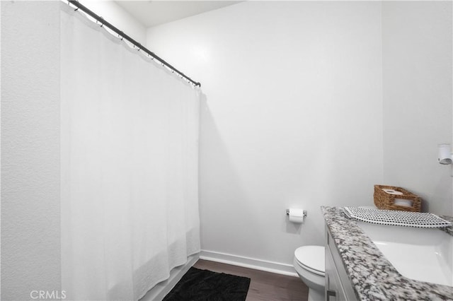 12366 Ranchito Way, Victorville, CA 92392 - full bath featuring wood finished floors, curtained shower, and vanity