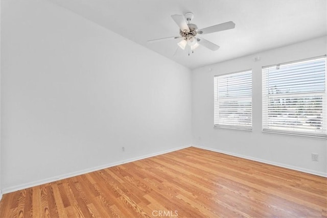 1225 N Alessandro St, Banning, CA 92220 - empty room with light wood finished floors, plenty of natural light, ceiling fan, and lofted ceiling