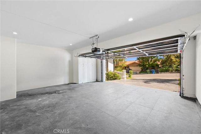 3856 Vista Linda Dr, Encino, CA 91316 - garage with a garage door opener and recessed lighting