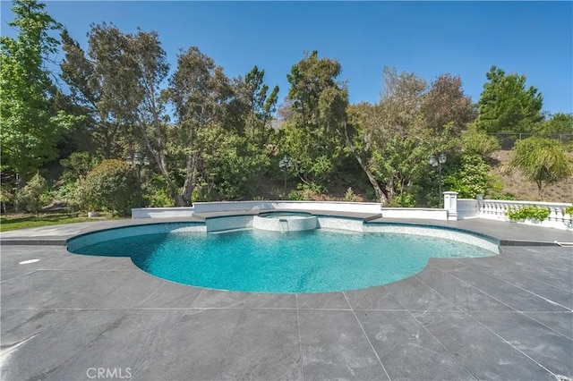 3856 Vista Linda Dr, Encino, CA 91316 - view of pool with a pool with connected hot tub, view of scattered trees, and a patio
