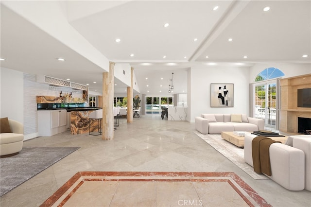 3856 Vista Linda Dr, Encino, CA 91316 - living room featuring recessed lighting, bar area, marble tiled floors, and inlaid floor details