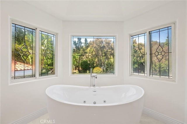 3856 Vista Linda Dr, Encino, CA 91316 - full bath featuring a freestanding tub and healthy amount of natural light