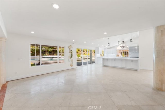 3856 Vista Linda Dr, Encino, CA 91316 - unfurnished living room with recessed lighting and baseboards