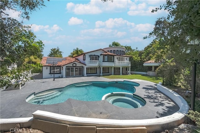 3856 Vista Linda Dr, Encino, CA 91316 - view of pool featuring a patio, a pool with connected hot tub, and a yard