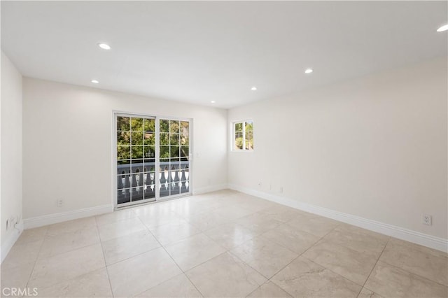 3856 Vista Linda Dr, Encino, CA 91316 - spare room with recessed lighting and light tile patterned floors