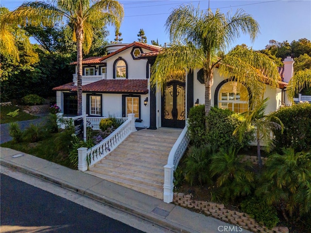 3856 Vista Linda Dr, Encino, CA 91316 - mediterranean / spanish house featuring stucco siding and a tile roof