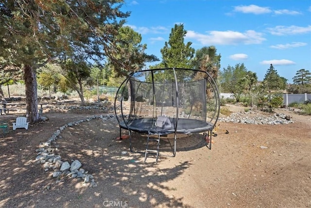 1946 Desert Front Rd, Wrightwood, CA 92397 - view of jungle gym featuring a trampoline and view of scattered trees