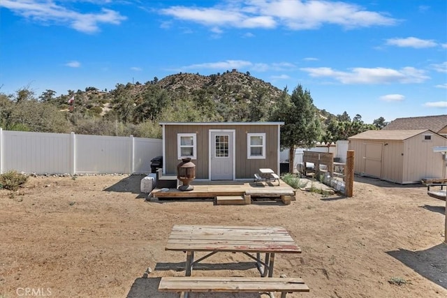 1946 Desert Front Rd, Wrightwood, CA 92397 - view of shed featuring a fenced backyard and a mountain view
