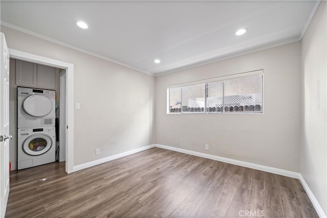 800 N Eucalyptus Ave Unit 108, Inglewood, CA 90302 - laundry room with stacked washer / dryer, cabinet space, crown molding, wood finished floors, and recessed lighting