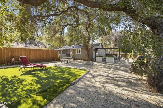 12710 Ojai Rd, Ojai, CA 93023 - fenced backyard with a patio area