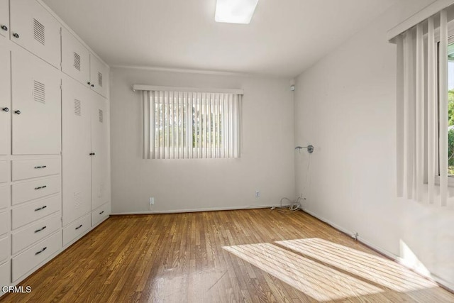 410 Palomares Ave, Ventura, CA 93003 - unfurnished bedroom with hardwood / wood-style floors and baseboards