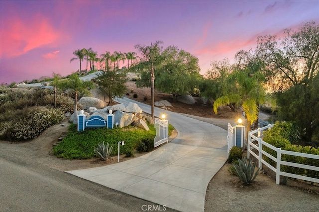 40115 Via Cordova, Temecula, CA 92592 - view of home's community with a fenced front yard and concrete driveway