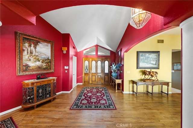 40115 Via Cordova, Temecula, CA 92592 - entrance foyer featuring arched walkways, wood finished floors, and vaulted ceiling