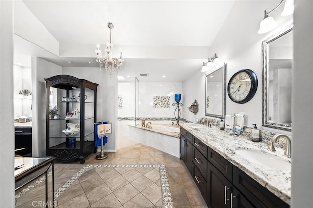 40115 Via Cordova, Temecula, CA 92592 - full bath featuring a garden tub, double vanity, tile patterned flooring, and a chandelier