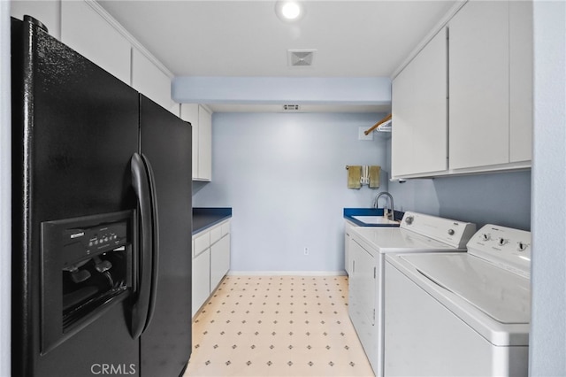 40115 Via Cordova, Temecula, CA 92592 - laundry area with washing machine and dryer, cabinet space, and light flooring