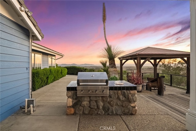 40115 Via Cordova, Temecula, CA 92592 - view of patio with a gazebo, an outdoor kitchen, and a mountain view