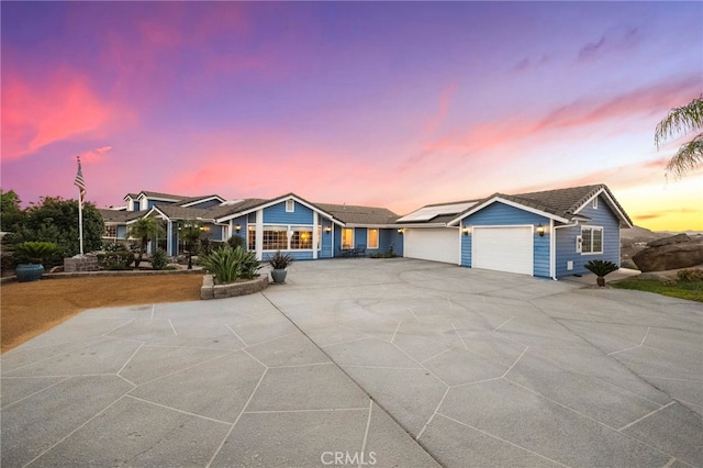 40115 Via Cordova, Temecula, CA 92592 - ranch-style home with solar panels, an attached garage, and driveway