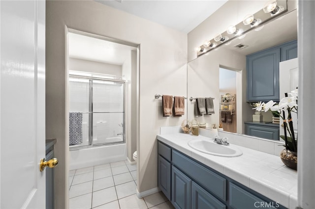 40115 Via Cordova, Temecula, CA 92592 - bathroom with vanity, enclosed tub / shower combo, and tile patterned floors