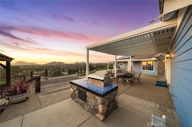 40115 Via Cordova, Temecula, CA 92592 - view of patio featuring a mountain view, a pergola, and grilling area