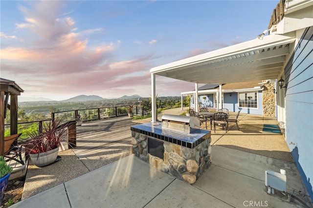 40115 Via Cordova, Temecula, CA 92592 - view of patio with a mountain view, exterior kitchen, and an outdoor bar