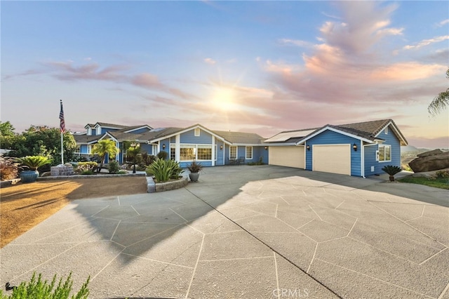 40115 Via Cordova, Temecula, CA 92592 - single story home with an attached garage, roof mounted solar panels, and driveway
