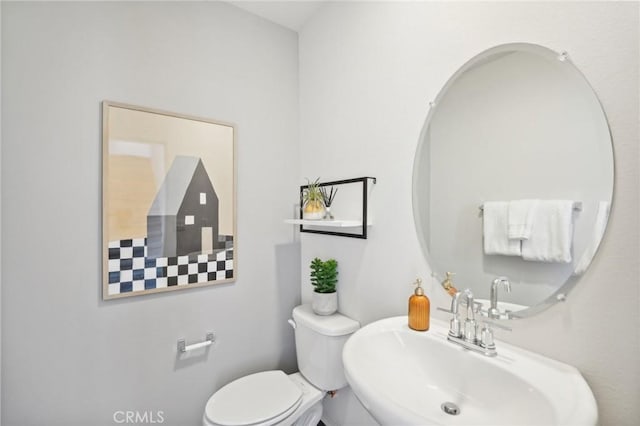14180 Astra St, Moreno Valley, CA 92555 - half bath featuring a sink and toilet