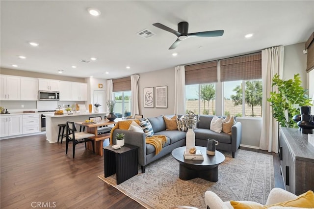 14180 Astra St, Moreno Valley, CA 92555 - living room with recessed lighting, ceiling fan, and wood finished floors