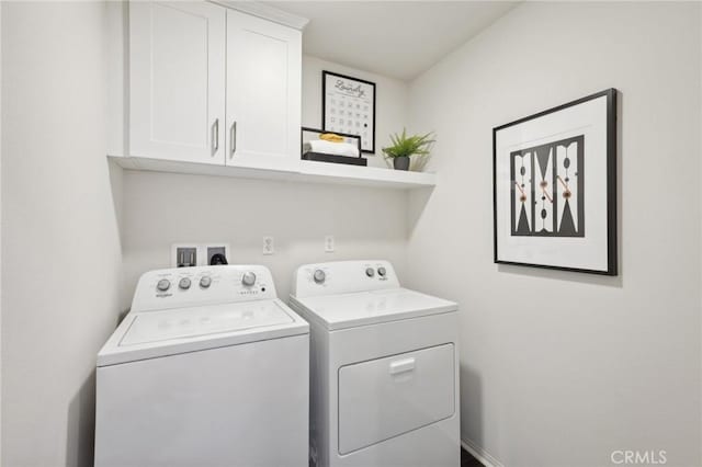 14180 Astra St, Moreno Valley, CA 92555 - laundry area with washer and dryer and cabinet space