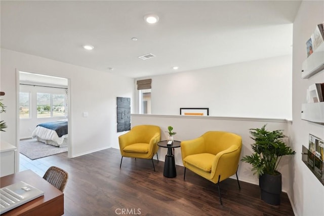 14180 Astra St, Moreno Valley, CA 92555 - sitting room featuring wood finished floors, recessed lighting, and a fireplace