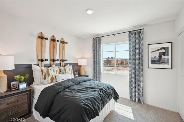 14180 Astra St, Moreno Valley, CA 92555 - carpeted bedroom featuring baseboards
