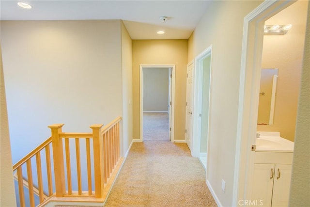 518 Barclay Way, Merced, CA 95348 - corridor featuring light colored carpet, an upstairs landing, and recessed lighting