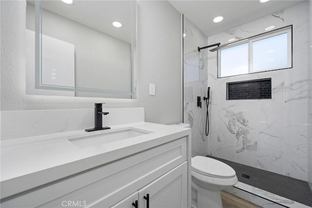 837 S Magnolia Ave, Anaheim, CA 92804 - bathroom featuring vanity, a marble finish shower, and recessed lighting