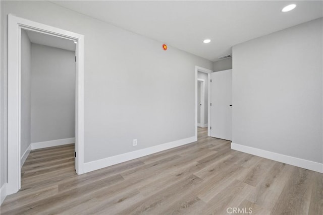 837 S Magnolia Ave, Anaheim, CA 92804 - unfurnished bedroom featuring wood finished floors and recessed lighting