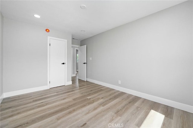 837 S Magnolia Ave, Anaheim, CA 92804 - unfurnished room with wood finished floors and recessed lighting