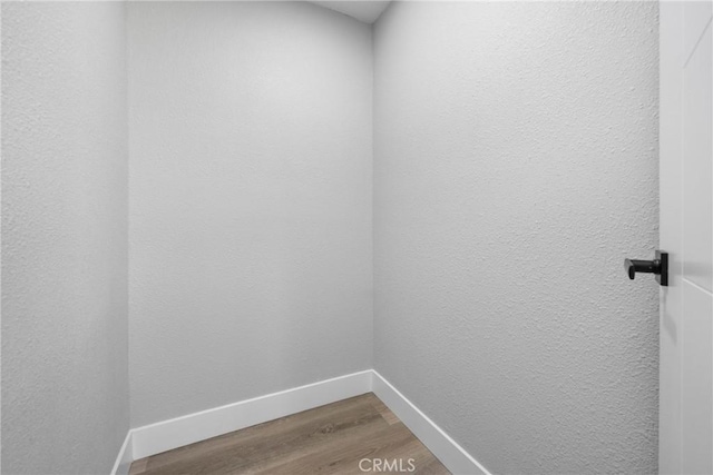 837 S Magnolia Ave, Anaheim, CA 92804 - unfurnished room featuring wood finished floors and baseboards