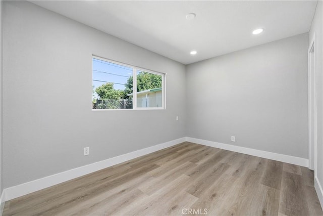 837 S Magnolia Ave, Anaheim, CA 92804 - unfurnished room with light wood finished floors and recessed lighting